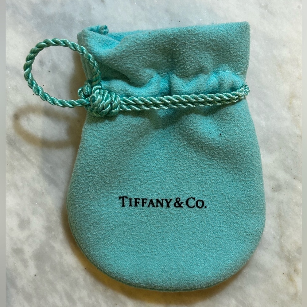 Authentic Tiffany ring dust bag.